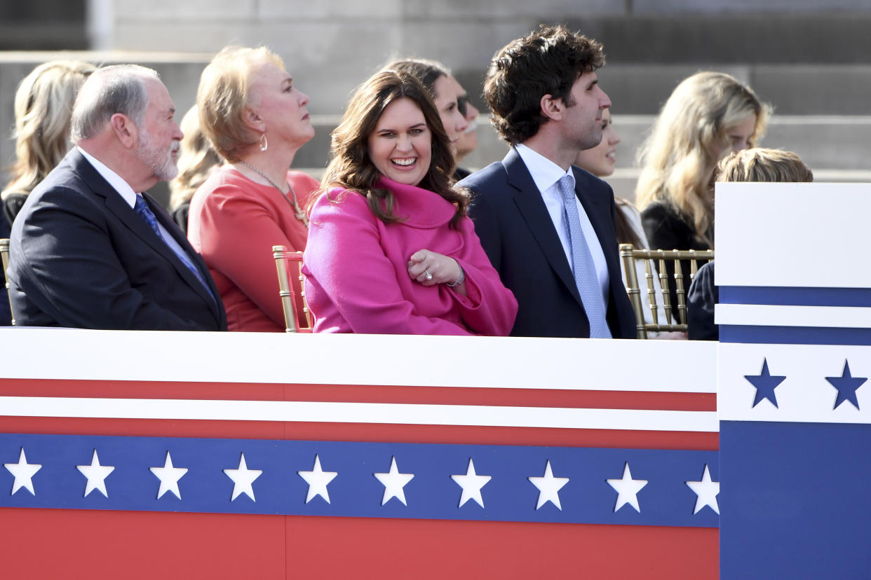 Arkansas Gov.-elect Sarah Huckabee Sanders reacts towards the crowd prior to taking the oath of the office on the steps of the Arkansas Capitol Tuesday, Jan. 10, 2023, in Little Rock, Ark. (AP Photo/Will Newton)