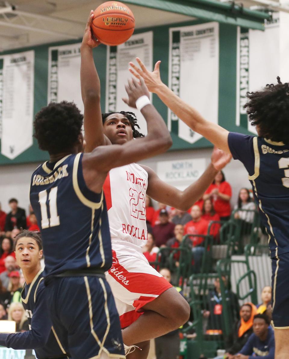 North Rockland's Elijah Barclay (23) drives to the basket against Newburgh during the boys Class AA regional final  playoff game at Yorktown High School March 11, 2023. North Rockland won the game 53-46.