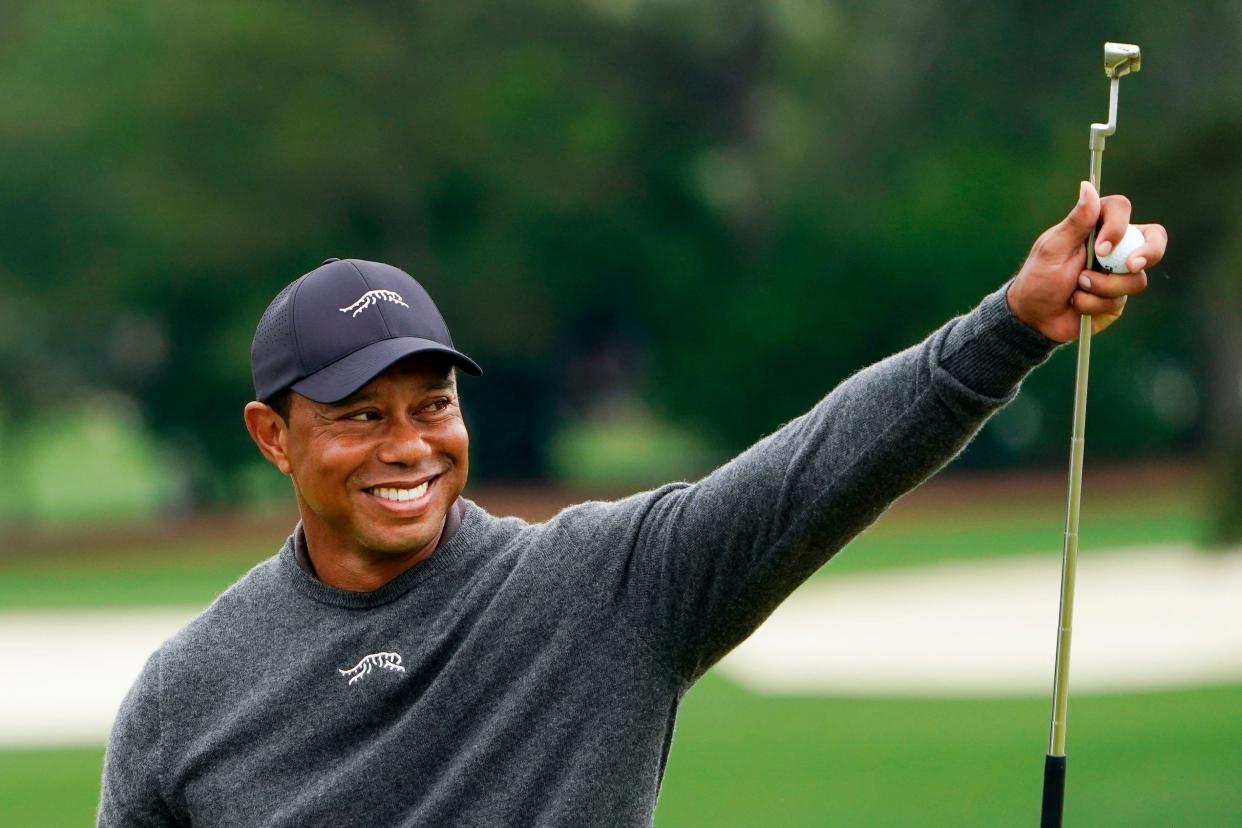 Tiger Woods gives a thumbs up to the crowd on the No. 9 green during a practice round for the Masters Tournament at Augusta National Golf Club in Augusta, Georgia on April 9, 2024. (Katie Goodale-USA TODAY NETWORK)