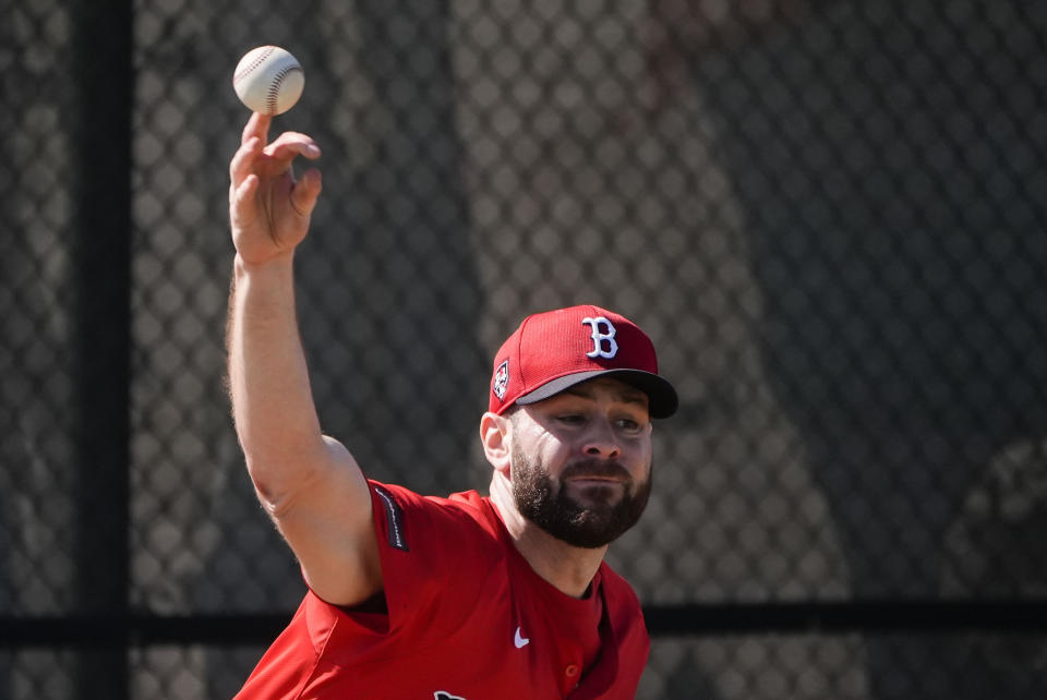 Red Sox pitcher Lucas Giolito works out during spring training in Fort Myers, Fla., Thursday, Feb. 15, 2024. (AP Photo/Gerald Herbert)