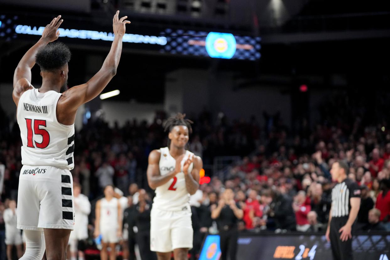 Cincinnati Bearcats forward John Newman III (15) is recognized after scoring his 1,000th career point in the first half vs. Bradley. UC won the NIT second-round game 74-57.