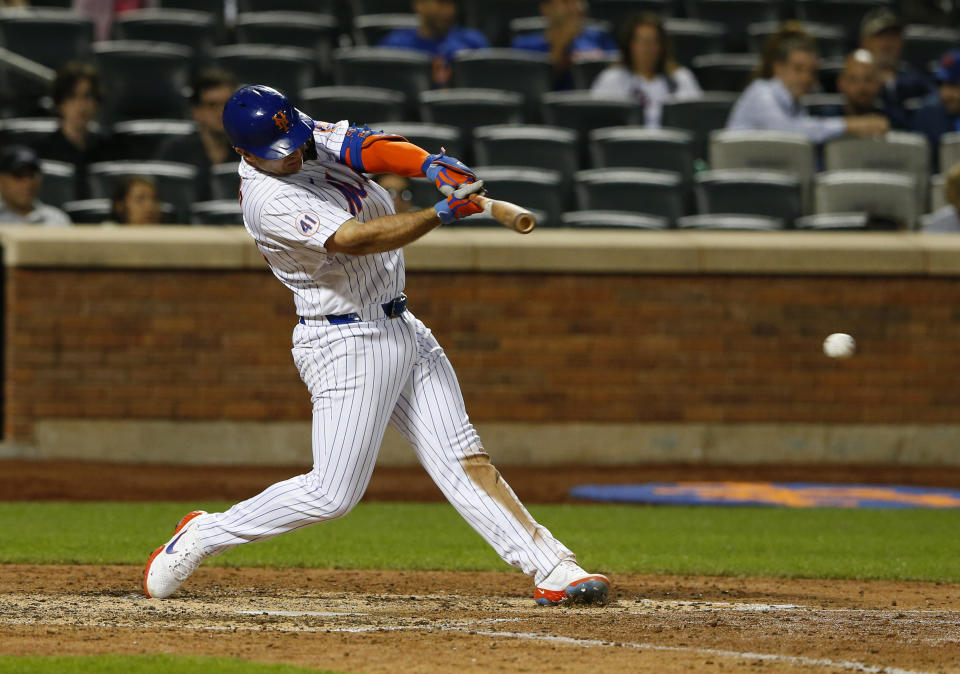 New York Mets first baseman Pete Alonso hits a single against the Atlanta Braves during the seventh inning of a baseball game Wednesday, June 23, 2021, in New York. (AP Photo/Noah K. Murray)