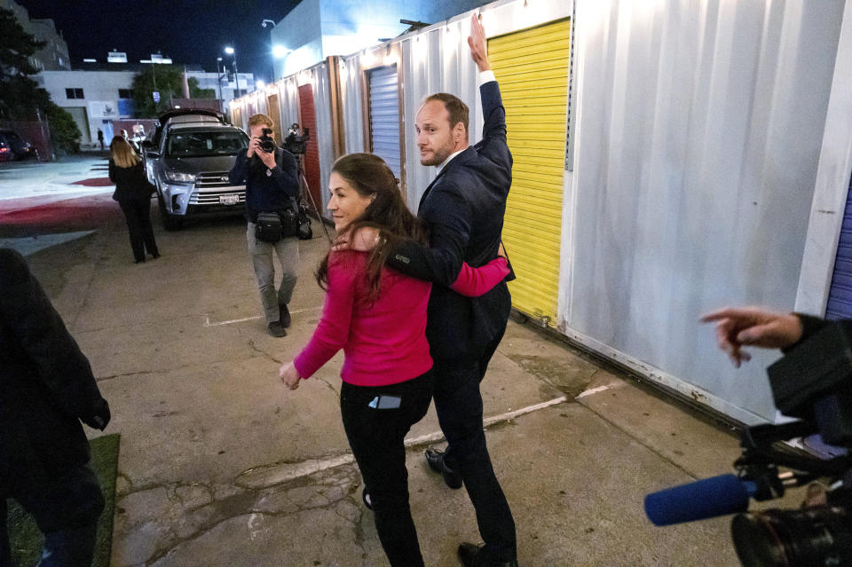 San Francisco District Attorney Chesa Boudin and his wife, Valerie Block, walking together on election night in June.