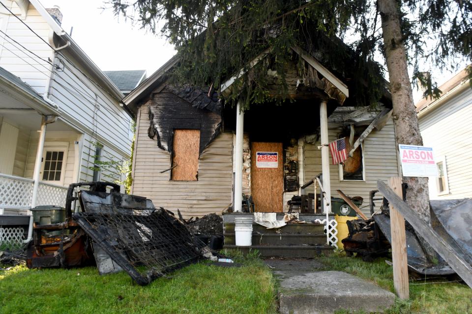 Canton firefighters found a dead man in a burning home early Wednesday morning at 200 Lincoln Ave. NW. Authorities believe the fire was intentionally set.