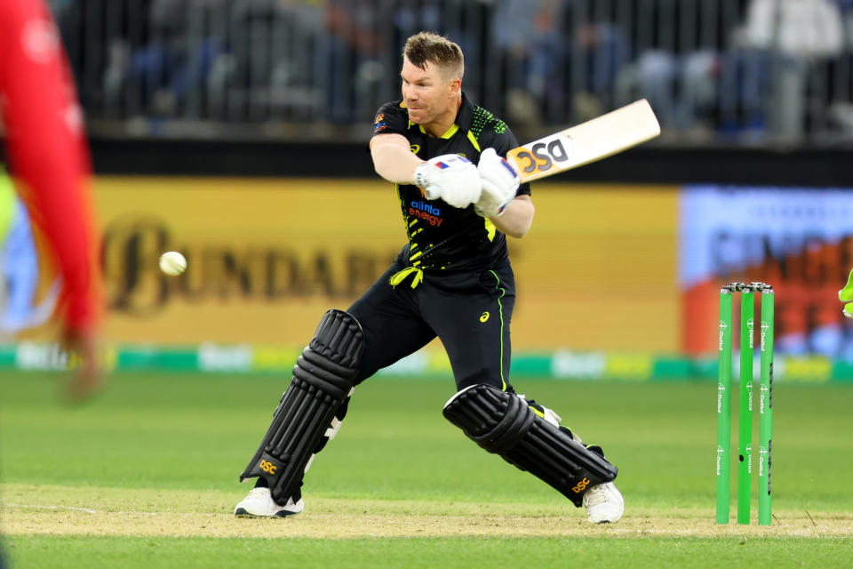 Seen here, Aussie batter David Warner plays a shot through the covers during a T20 International against England. 