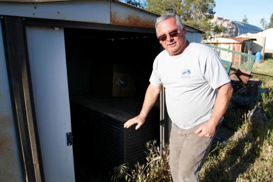 Lloyd “Ed” Rickard stands in front of a shed that holds the second wellhead on his property in rural Paso Robles. After Rickard’s well went dry in 2018, he trucked in water for several years before saving up $30,000 to drill a deeper well.