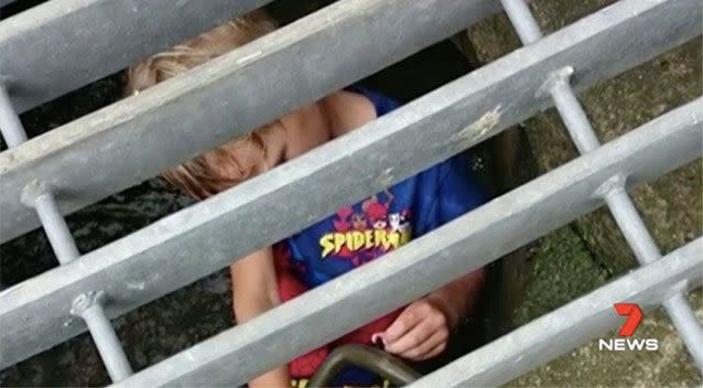 Fears four-year-old boy Drasic could have been swept away after becoming stuck in a drain at Queensland's Sunshine Coast. Source: 7 News