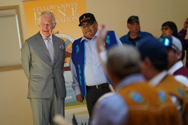 The Prince of Wales watches a display following a roundtable with Yellowknives Dene First Nation Leadership in Yellowknife