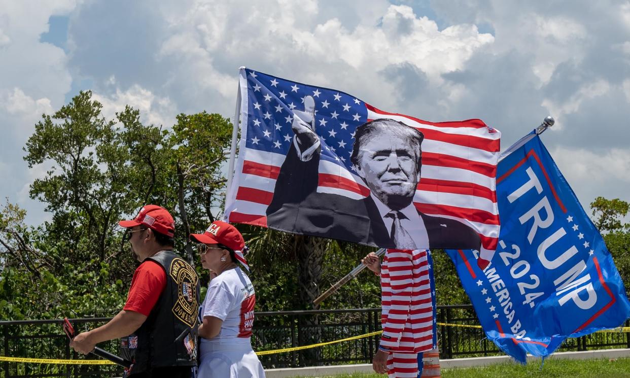 <span>Supporters of Donald Trump hold a rally before Trump's appearance in Miami federal court in Palm Beach, Florida, on 11 June 2023.</span><span>Photograph: Gary I Rothstein/UPI/Shutterstock</span>