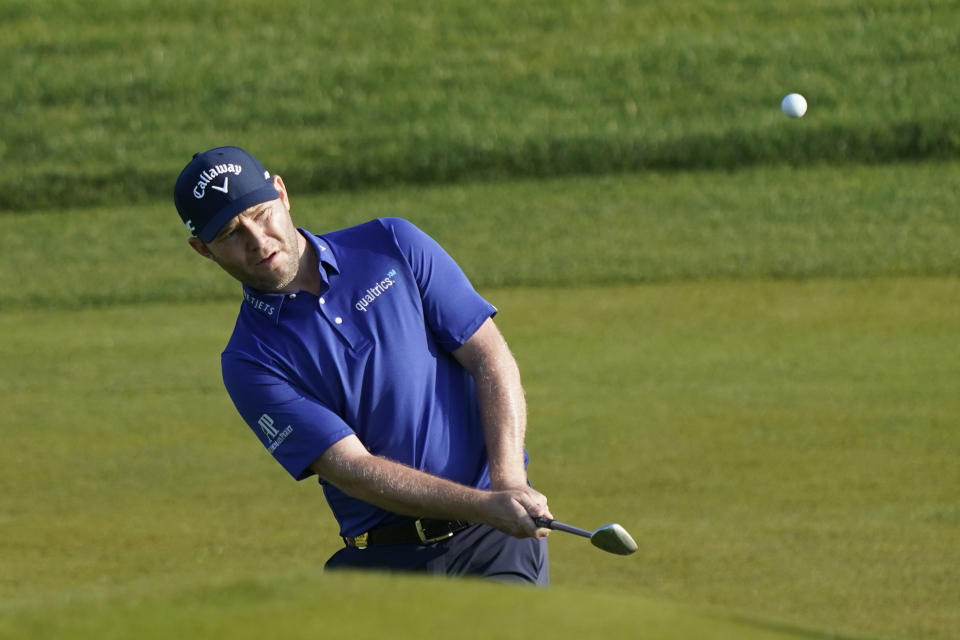 Branden Grace, of South Africa, chips up to the first green during the second round of the PGA Championship golf tournament on the Ocean Course Friday, May 21, 2021, in Kiawah Island, S.C. (AP Photo/Matt York)