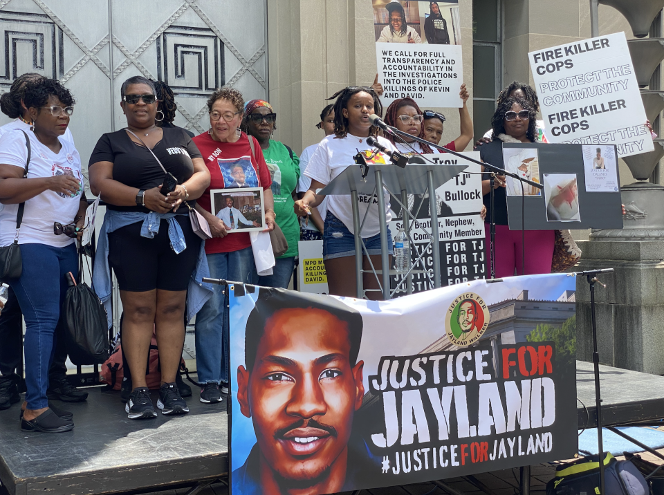 People gather outside of the Department of Justice to rally on behalf of Jayland Walker