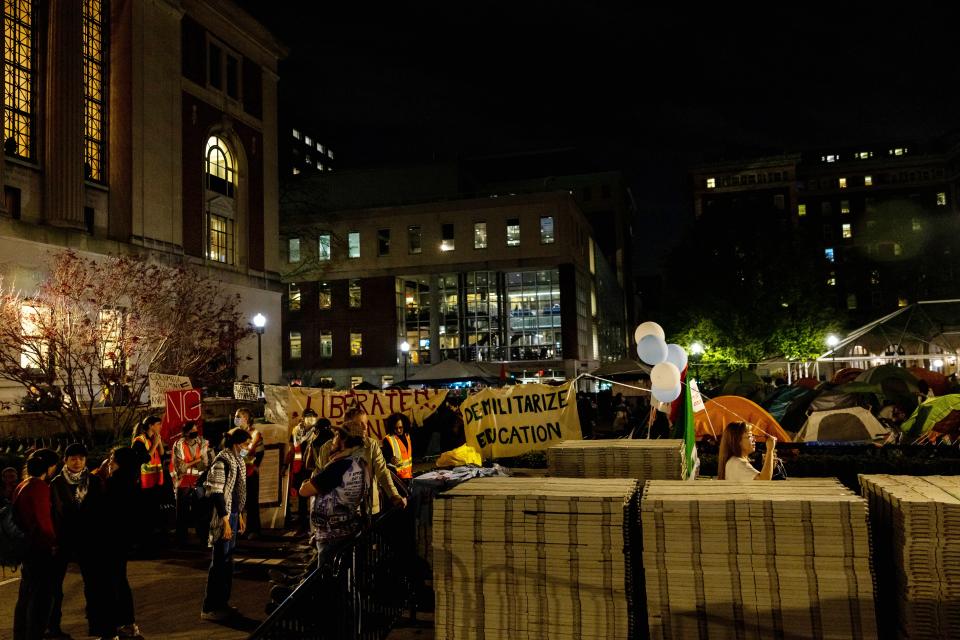 Demonstrators at Columbia University remain outside an encampment in support of Palestinians in Gaza in New York City.