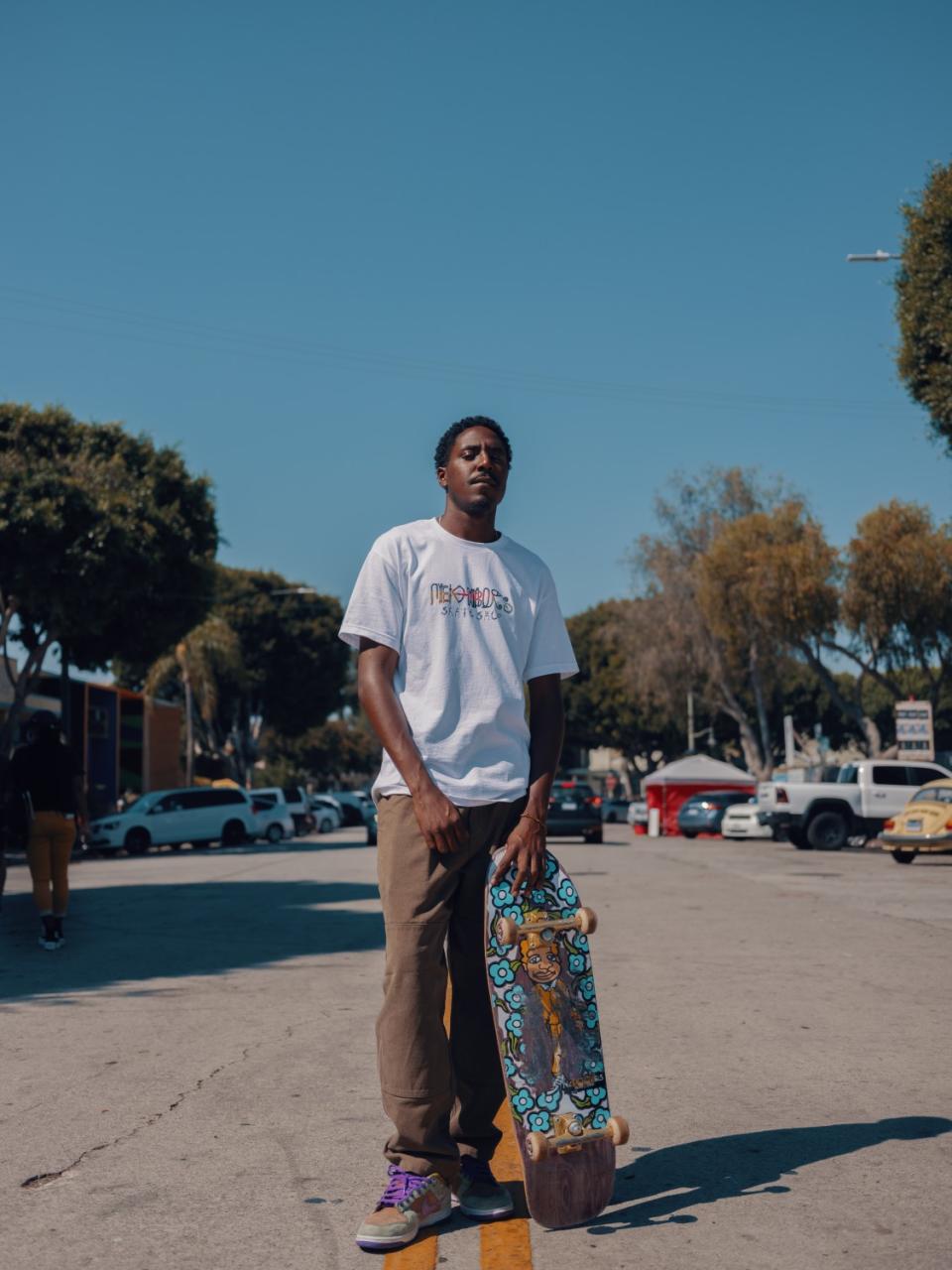 Kilam McCullough, 25, lives in Leimert Park and has worked at Neighbors Skate Shop since it opened two years ago.