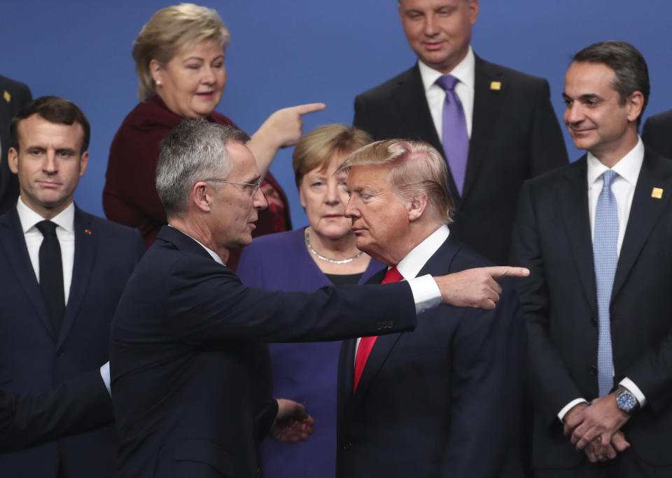 FILE - NATO Secretary General Jens Stoltenberg, center front left, speaks with then-U.S. President Donald Trump, center front right, at a NATO leaders’ meeting in Watford, England, Wednesday, Dec. 4, 2019. As chances rise of a Joe Biden-Trump rematch in the U.S. presidential election race, America’s allies are bracing for a bumpy ride. In campaign speeches, Trump remains skeptical of organizations such as NATO. (AP Photo/Francisco Seco, File)