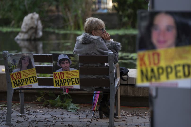 People gather for a protest in Tel Aviv calling for the return of 40 children among the roughly 240 hostages believed held by Hamas militants in the Gaza Strip, November 2023