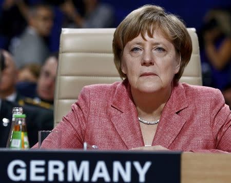 Germany's Chancellor Angela Merkel attends a working session at the NATO Summit in Warsaw, Poland July 9, 2016. REUTERS/Kacper Pempel