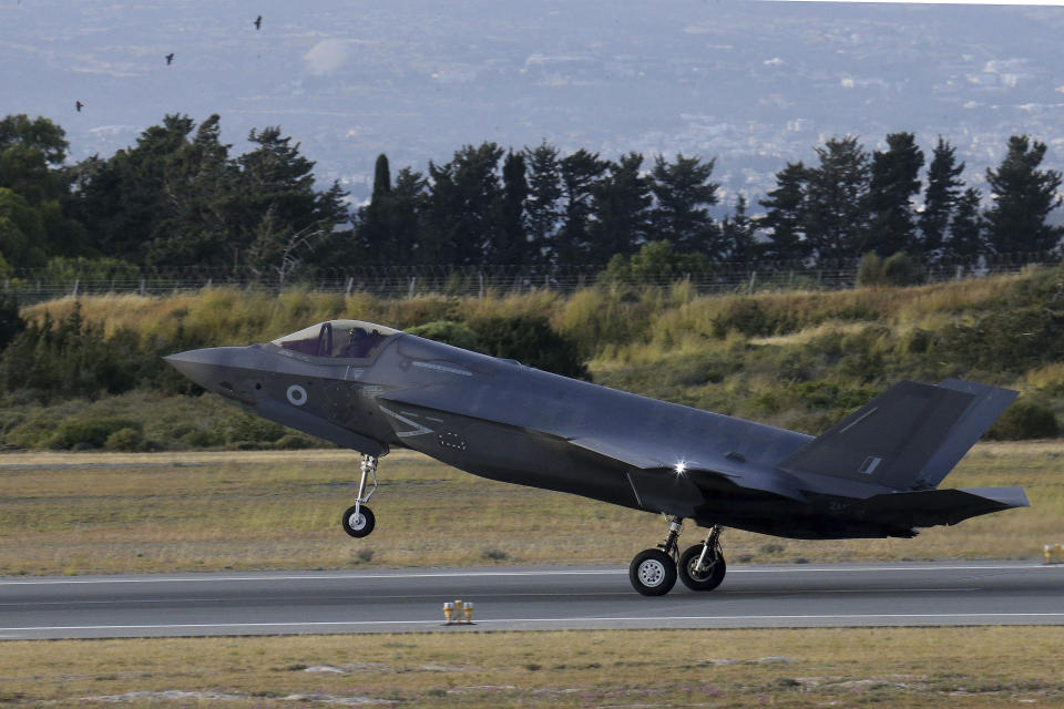 FILE - In this Tuesday, May 21, 2019 file photo, a F-35B aircraft lands at Akrotiri Royal air forces base near coastal city of Limassol, Cyprus. Britain's defense secretary said the country's most advanced military aircraft, the Lightning F-35B, that is undergoing training at a British air base in Cyprus has flown its first missions over Syria and Iraq as part of the ongoing operations against the Islamic State group, in a statement issued Tuesday June 25, 2019. (AP Photo/Petros Karadjias, File)