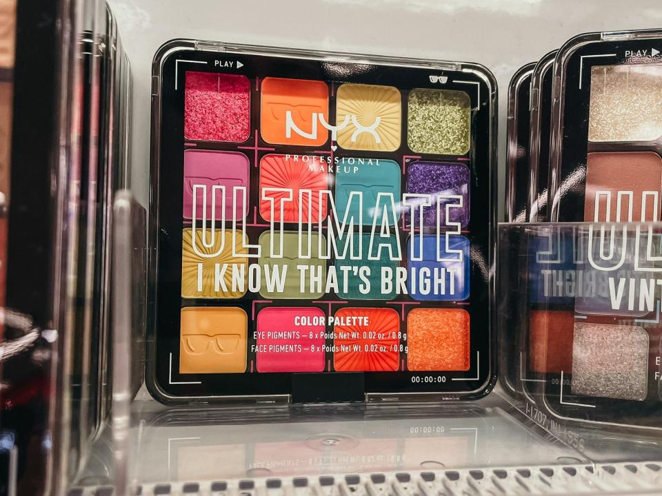 nyx eyeshadow palettes on the shelves at he drug store