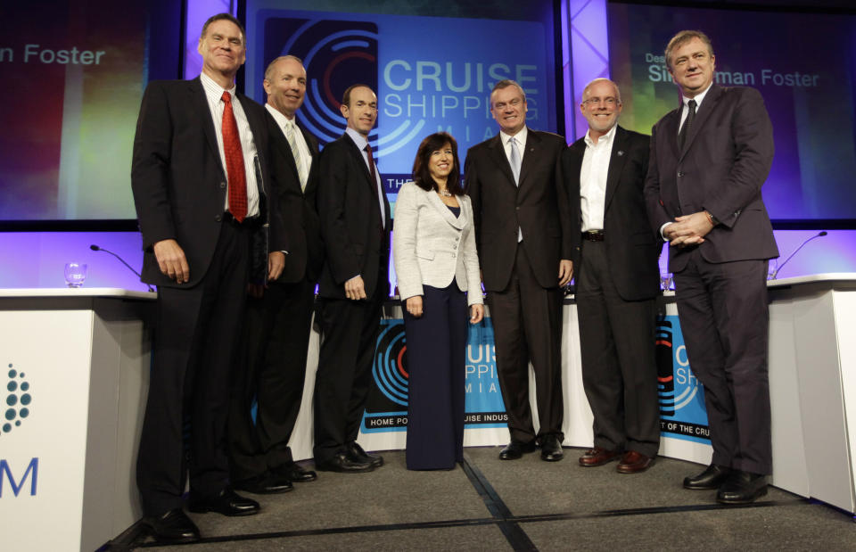 Posing for a group photo following a roundtable discussion on the state of the cruise ship industry are, from left to right, Gerald Cahill, President and CEO of Carnival Cruise Lines, Daniel Hanrahan, President and CEO of Celebrity Cruises, Adam Goldstein, President and CEO of Royal Caribben International, Christine Duffy, President of Cruise Lines International Association, Stein Kruse, President and CEO of Holland America, Kevin Sheehan, President and CEO of Norwegian Cruise Line, and Pierfrancesco Vago, CEO of MSC CRuises, at the Cruise Shipping Miami conference, Tuesday, March 13, 2012, in Miami Beach, Fla. (AP Photo/Lynne Sladky)