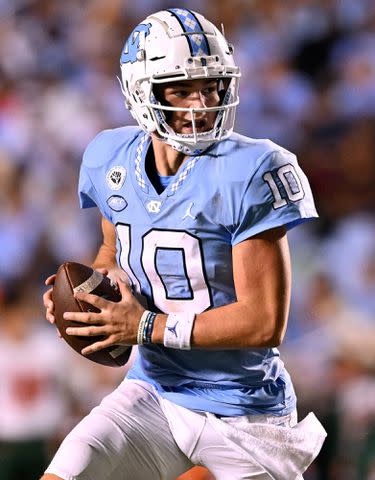 <p>Grant Halverson/Getty</p> Drake Maye looks to pass against the Florida A&M Rattlers during their game on August 27, 2022 in Chapel Hill, North Carolina.