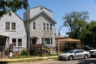 Crime scene tape hangs outside a house where multiple people were shot, some fatally, inside the Englewood building, Tuesday, June 15, 2021, in Chicago.