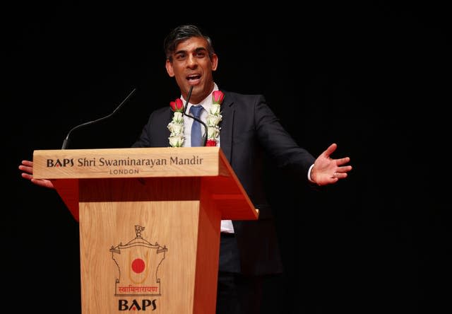 Rishi Sunak speaks at a lectern