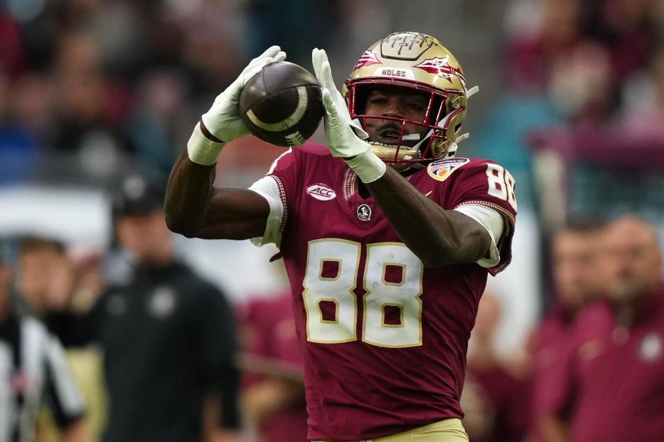 Florida State Seminoles wide receiver Kentron Poitier (88) makes a catch against the Georgia Bulldogs during the first half in the 2023 Orange Bowl on December 30, 2023, at Hard Rock Stadium in Miami Gardens, Florida.