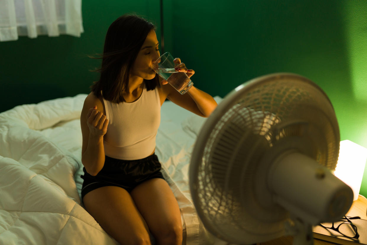 Keeping a glass of water by your bed can help counteract a dry throat. (Getty Images)