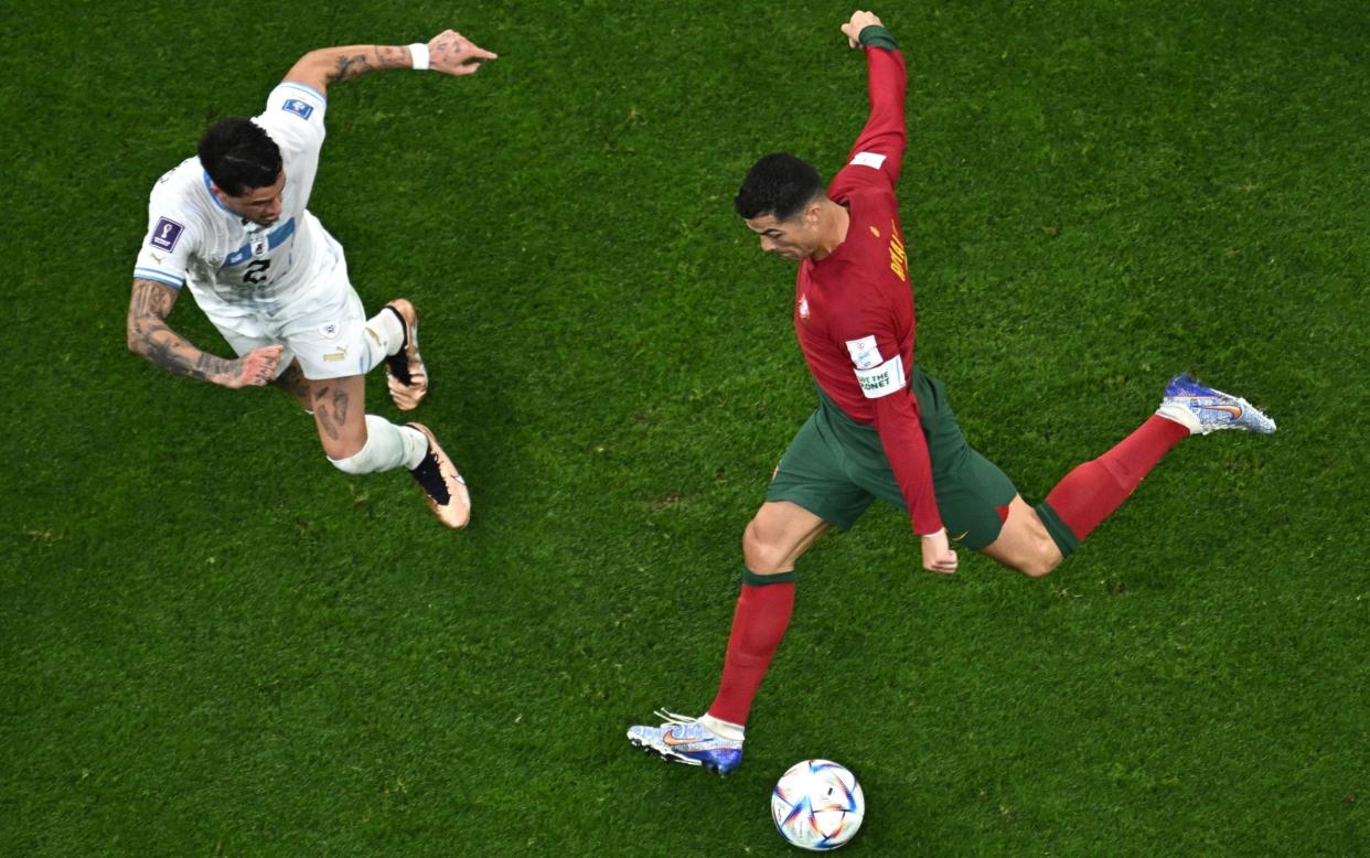 José María Giménez (left) attempts to block a shot from Cristiano Ronaldo - Every team in the World Cup ranked – and England are not in the top five - Manan Vatsyayana/Getty Images