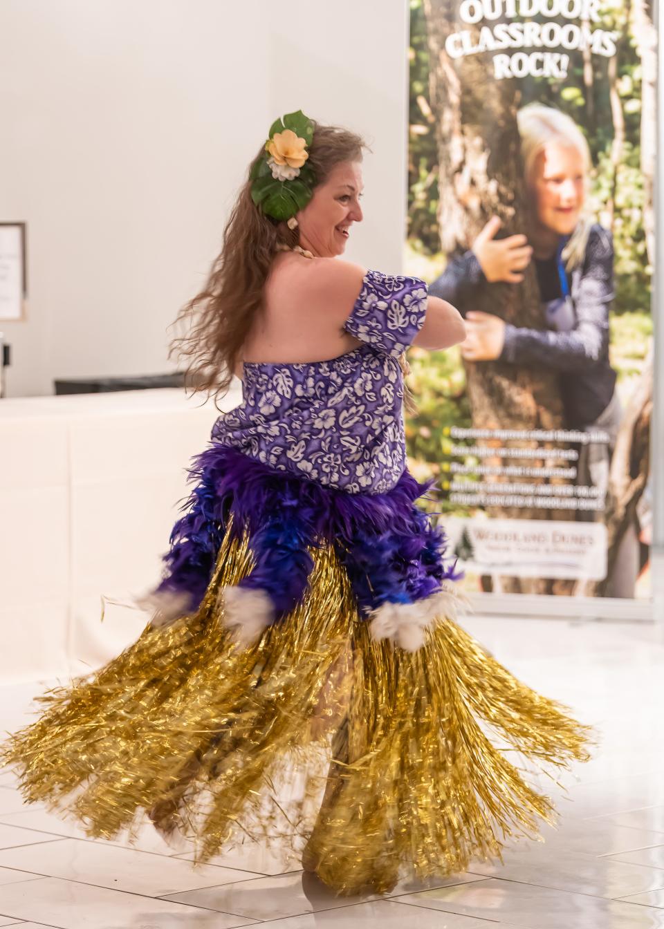 April Basten, a Polynesian-style dancer, surprised the Tropical Blast crowd with three solo performances, ending with a rendition of Aloha Oe.