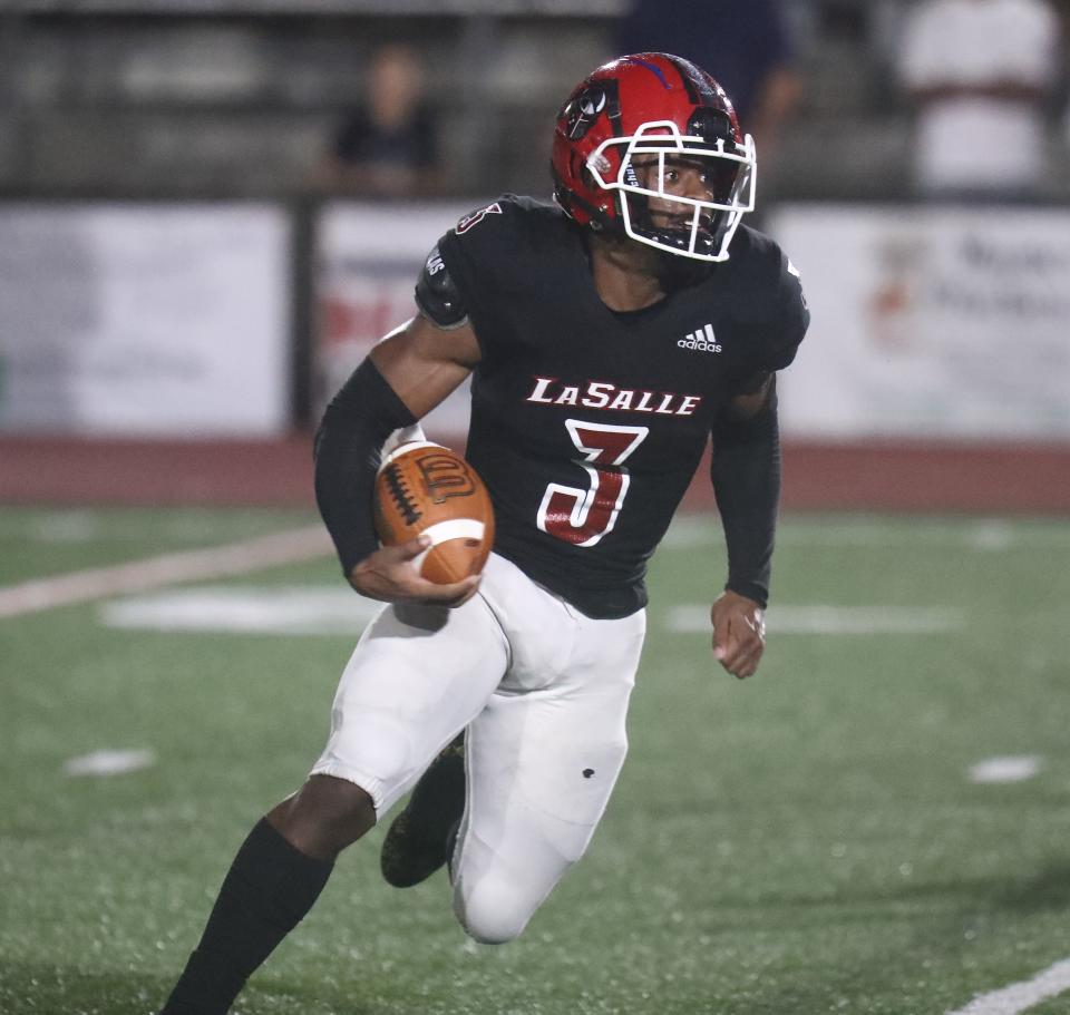 La Salle running back Gi'Bran Payne runs the ball during their football game against Winton Woods, Friday, Aug. 27, 2021.