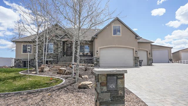 <p>Rick Bowmer/AP</p> The family home in Kamas, Utah where Eric Richins died March 4, 2022.