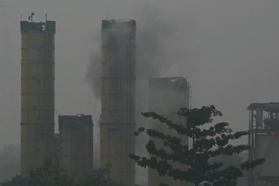 Smoke rises from a furnace at a construction site in New Delhi (AFP via Getty Images)