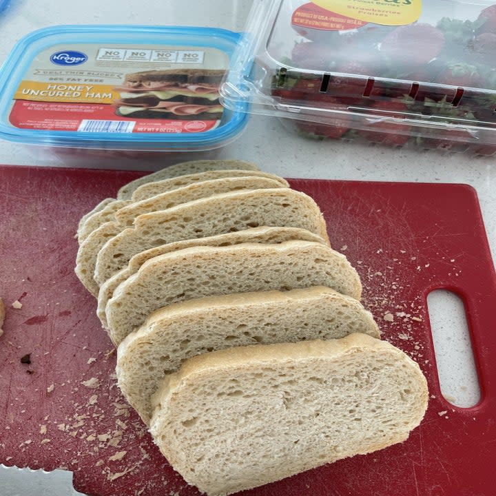 Bread sliced on a cutting board