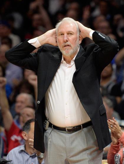 Gregg Popovich prepares for a full eight hours of sleep. (Harry How/Getty Images)