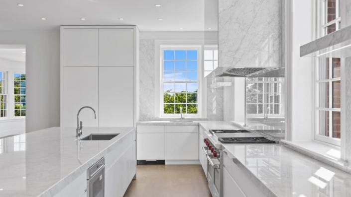 The renovated kitchen - Credit: Douglas Elliman