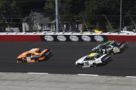 Daniel Hemric (18) is followed by AJ Allmendinger (16) and Justin Allgaier (7) during a NASCAR Xfinity Series auto race Saturday, Sept. 4, 2021, in Darlington, S.C. (AP Photo/John Amis)