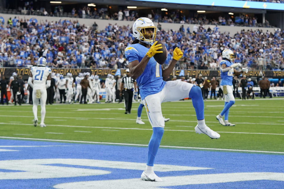 Los Angeles Chargers wide receiver Quentin Johnston celebrates his touchdown catch during the second half an NFL football game against the Detroit Lions Sunday, Nov. 12, 2023, in Inglewood, Calif. (AP Photo/Gregory Bull)