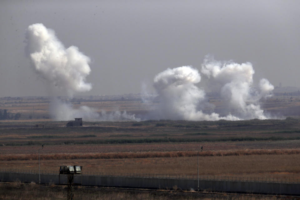 In this photo taken from the Turkish side of the border between Turkey and Syria, in Akcakale, Sanliurfa province, southeastern Turkey, smoke billows from targets inside Syria during bombardment by Turkish forces, Oct. 10, 2019. (Photo: Lefteris Pitarakis/AP)