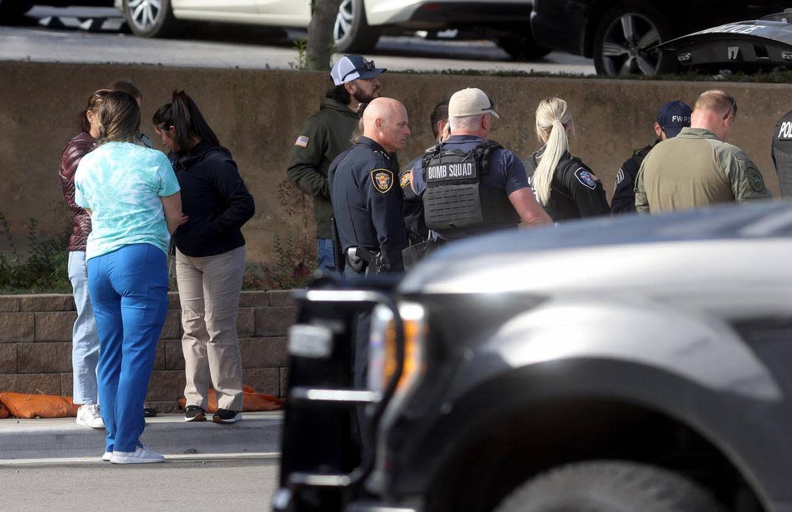 Members of the Fort Worth Police Department and other emergency personnel respond to a report of a potential threat at the University of North Texas Health Science Center in Fort Worth on Wednesday, November 16, 2022. University officials encouraged everyone in the area to seek shelter immediately in a secure location.