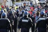 French gendarmes take position after striking workers blockaded roads near the oil refinery at Fos-sur-Mer, near Marseille, France, May 24, 2016 as France's hardline CGT and FO unions continue their stance against labour market reforms. REUTERS/Jean-Paul Pelissier