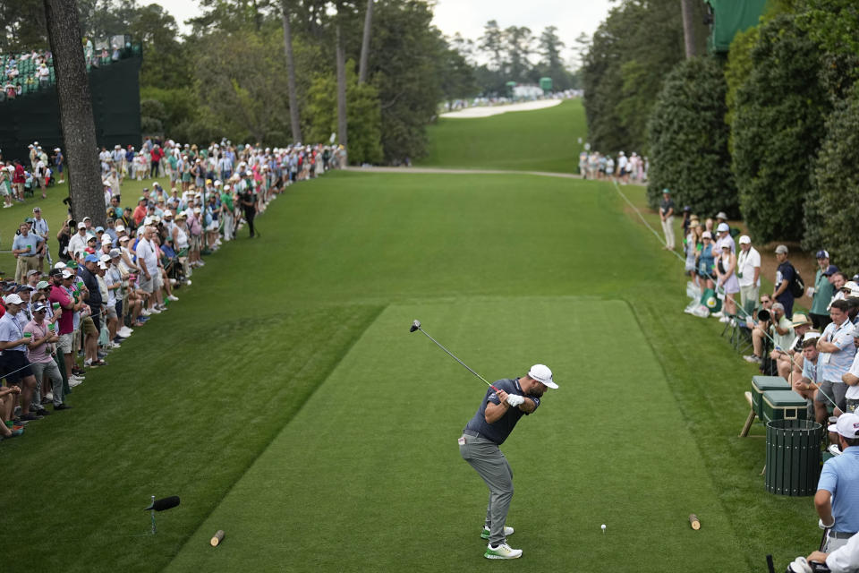 Jon Rahm, of Spain, hits his tee shot on the 18th hole during the first round of the Masters golf tournament at Augusta National Golf Club on Thursday, April 6, 2023, in Augusta, Ga. (AP Photo/David J. Phillip)