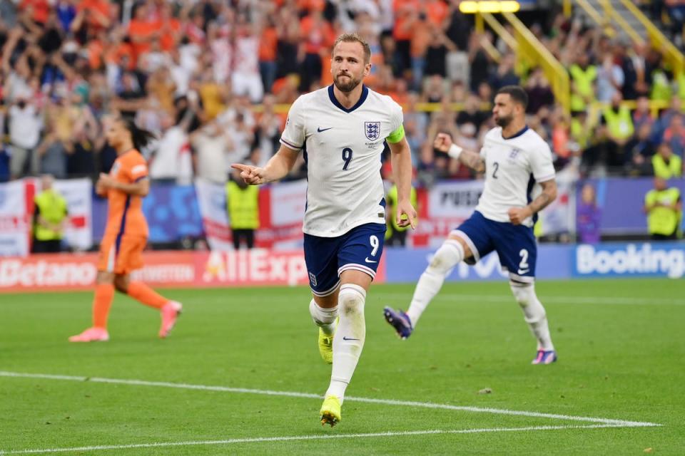 Harry Kane celebrates scoring his team's first goal (Getty Images)