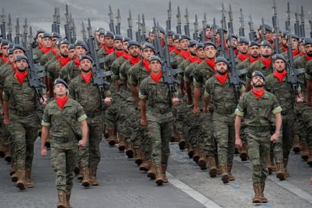 The traditional Bastille Day military parade on the Champs-Elysees Avenue in Paris