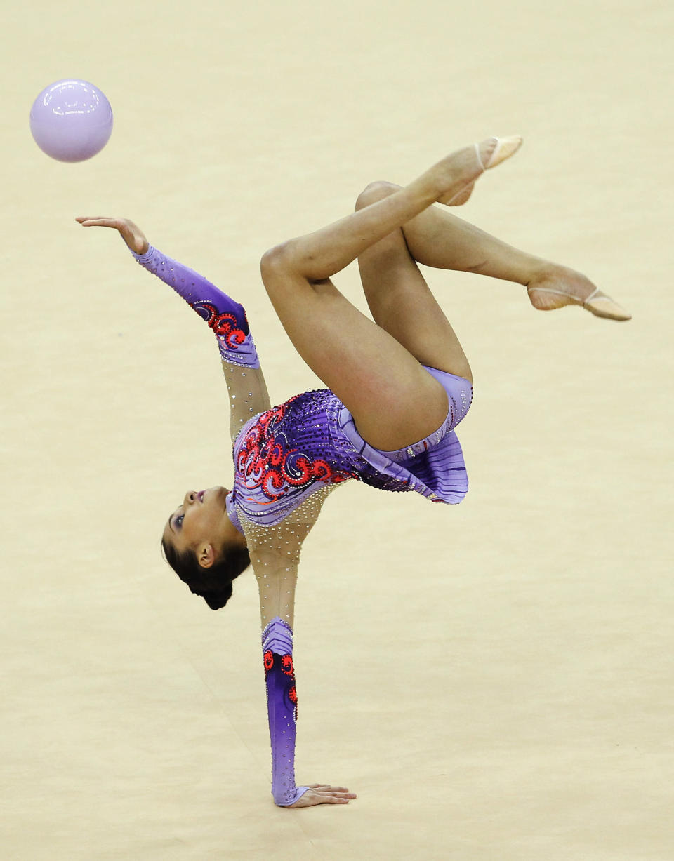 Djamila Rakhmatova of Uzbekistan in action in the Individual All-Around during the FIG Rhythmic Gymnastics Olympic Qualification round in London.