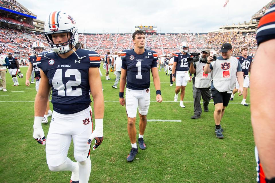 Auburn Tigers quarterback Payton Thorne (1) walks off the field after the game as Auburn Tigers take on California Golden Bears at Jordan-Hare Stadium in Auburn, Ala., on Saturday, Sept. 7, 2024. California Golden Bears defeated Auburn Tigers 21-14.