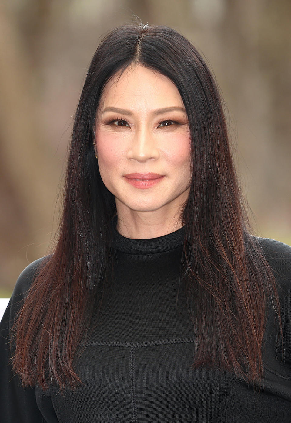 <p> A centre parting paired with a hairstyle that doesn't feature much graduation in length, like actress Lucy Liu's sleek look here, has a kind of 60s-meets-70s vibe to it. Keeping your hair mostly one length can give it a thicker appearance – making it a good hairstyle for fine hair that's on the thin side, too. </p>