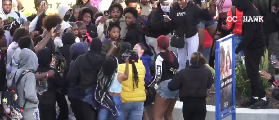 Two youths got into a fistfight at the Long Beach Pike Outlets as several hundred juveniles in the area arrived for a meetup. Long Beach Police broke up the fight and patrolled the area on March 16, 2024. (OC Hawk)