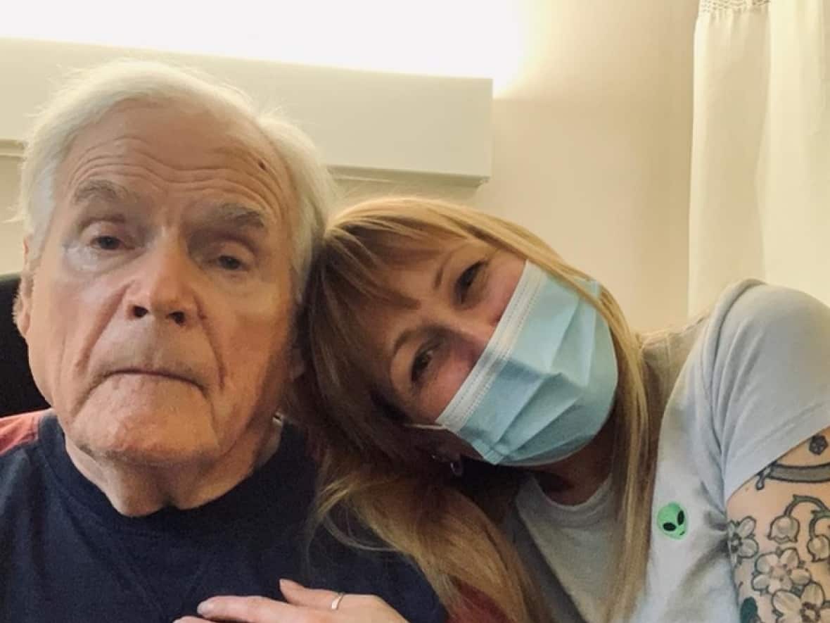 Jacy Ruuhala, a North York resident, poses with her father in his long-term care home. There is no air conditioning in his room and he is suffering, she says. (Submitted by Jacy Ruuhala - image credit)