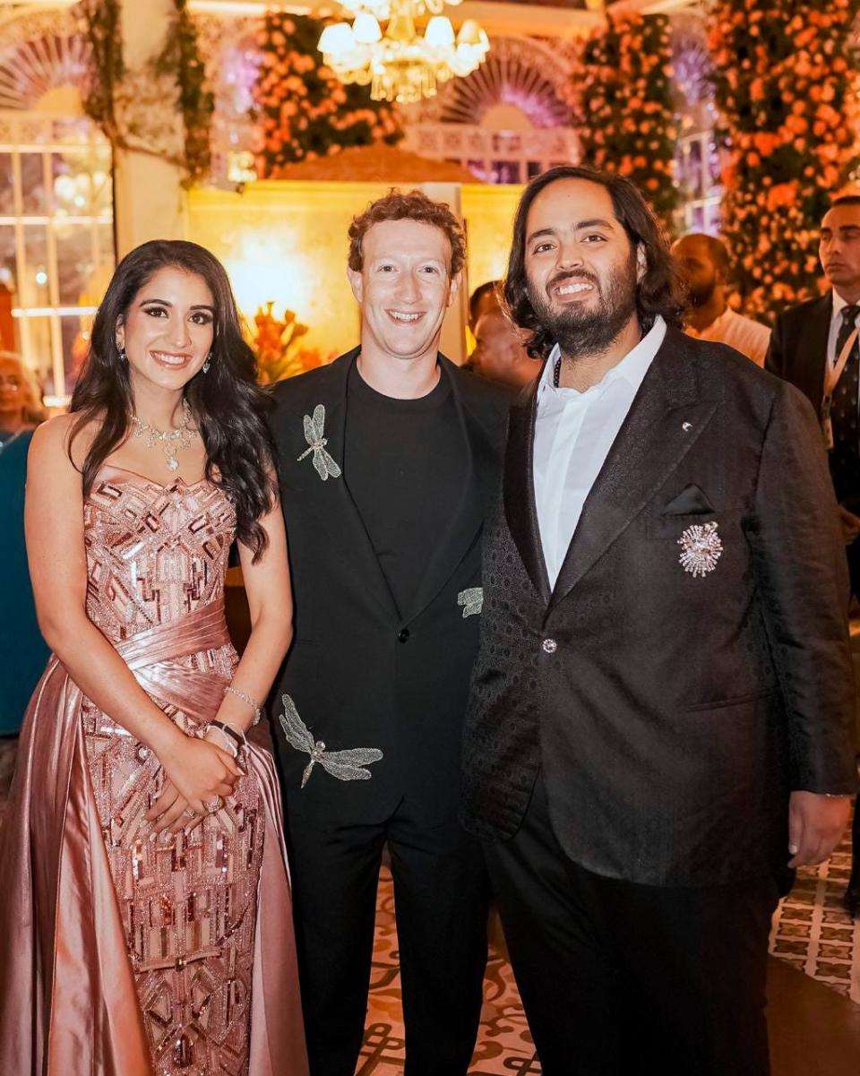 This photograph released by the Reliance group shows Mark Zuckerberg, center, posing for a photograph with billionaire industrialist Mukesh Ambani's son Anant Ambani, right, and Radhika Merchant at their pre-wedding bash in Jamnagar, India, Saturday, Mar. 02, 2024.